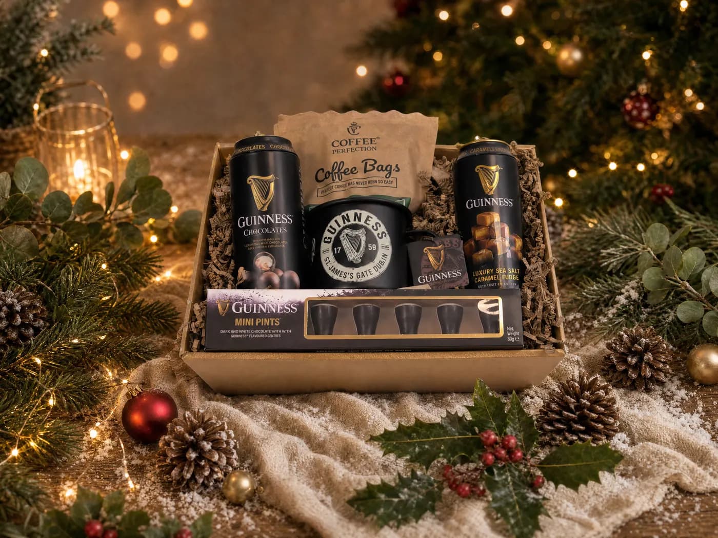 For the Guinness Lover dressed for Christmas, with Guinness chocolates, caramel fudge, an enamel mug, coffee bags and mini pint chocolates