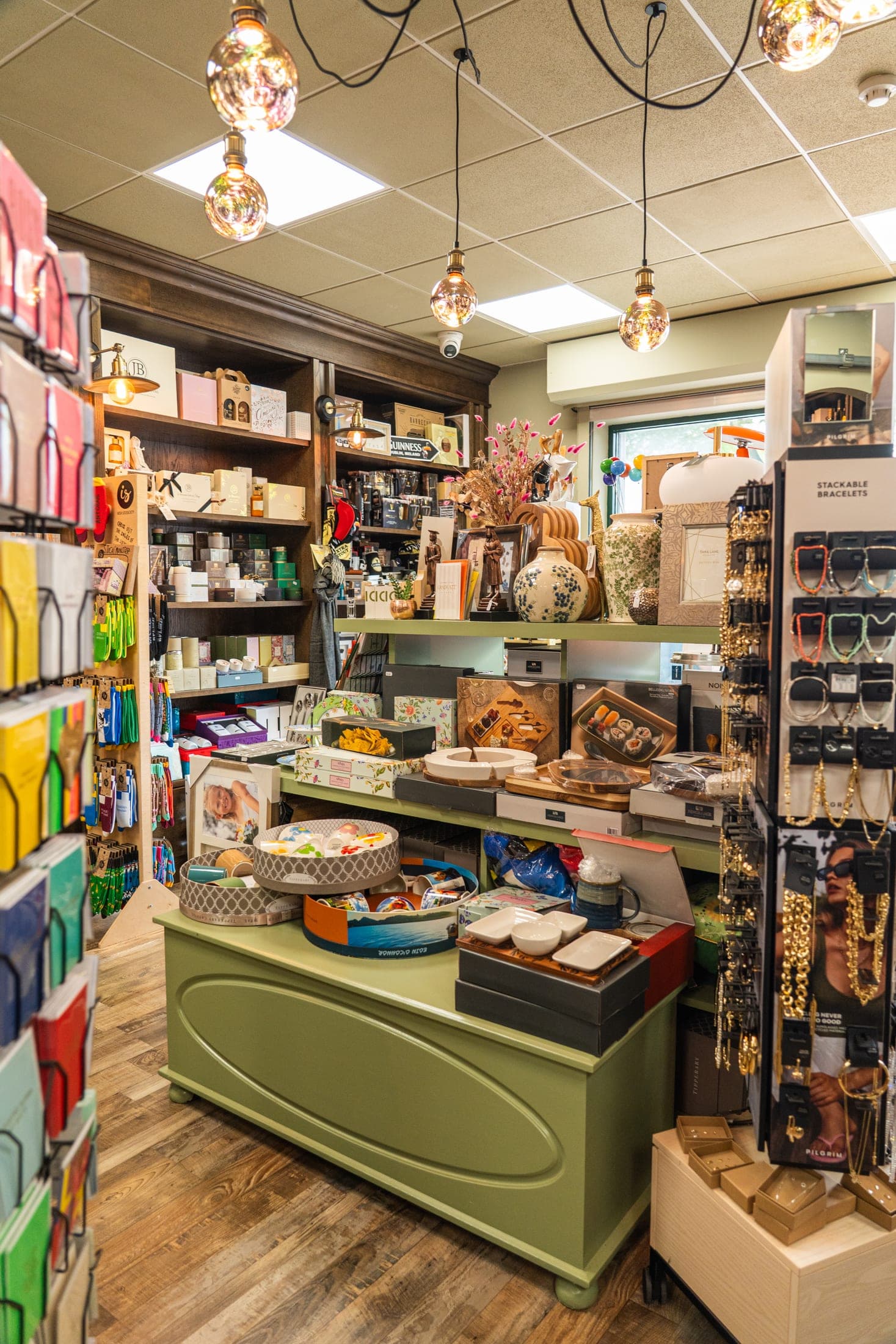 Inside The Parcel Concierge in Dunshaughlin, with greeting cards, jewellery, homeware and serving boards on display